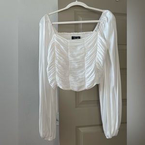 DO+BE White long puff sleeve, with smocked back.